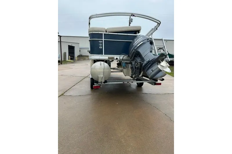 Slide: The Image of 2015 Godfrey Sweetwater 1880 CX pontoon boat with Yamaha outboard motor, rear view. - 4