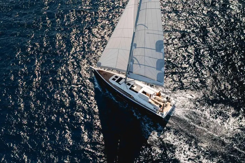 Slide: The Image of Beneteau Oceanis 47 sailboat 2027 on open sea. - 8