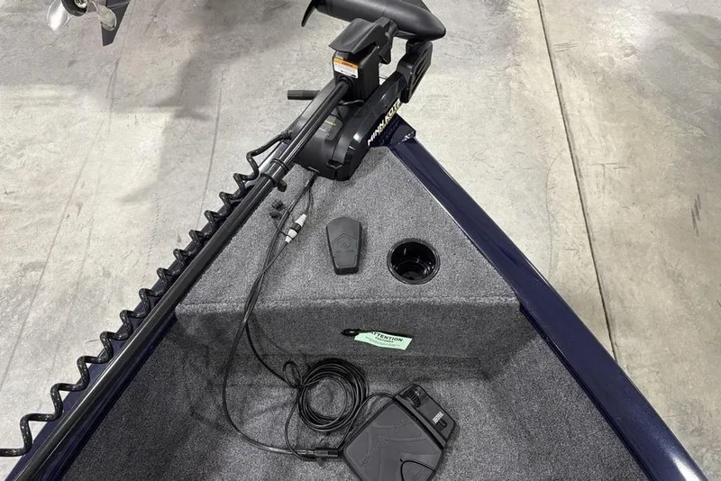 Slide: The Image of 2026 Tracker Super Guide V-16 SC boat with trolling motor and foot pedal on deck. - 7