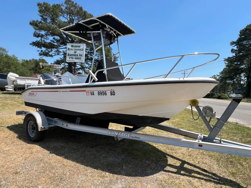 The Image of 2004 Boston Whaler 160 Dauntless on trailer, side view. - 0