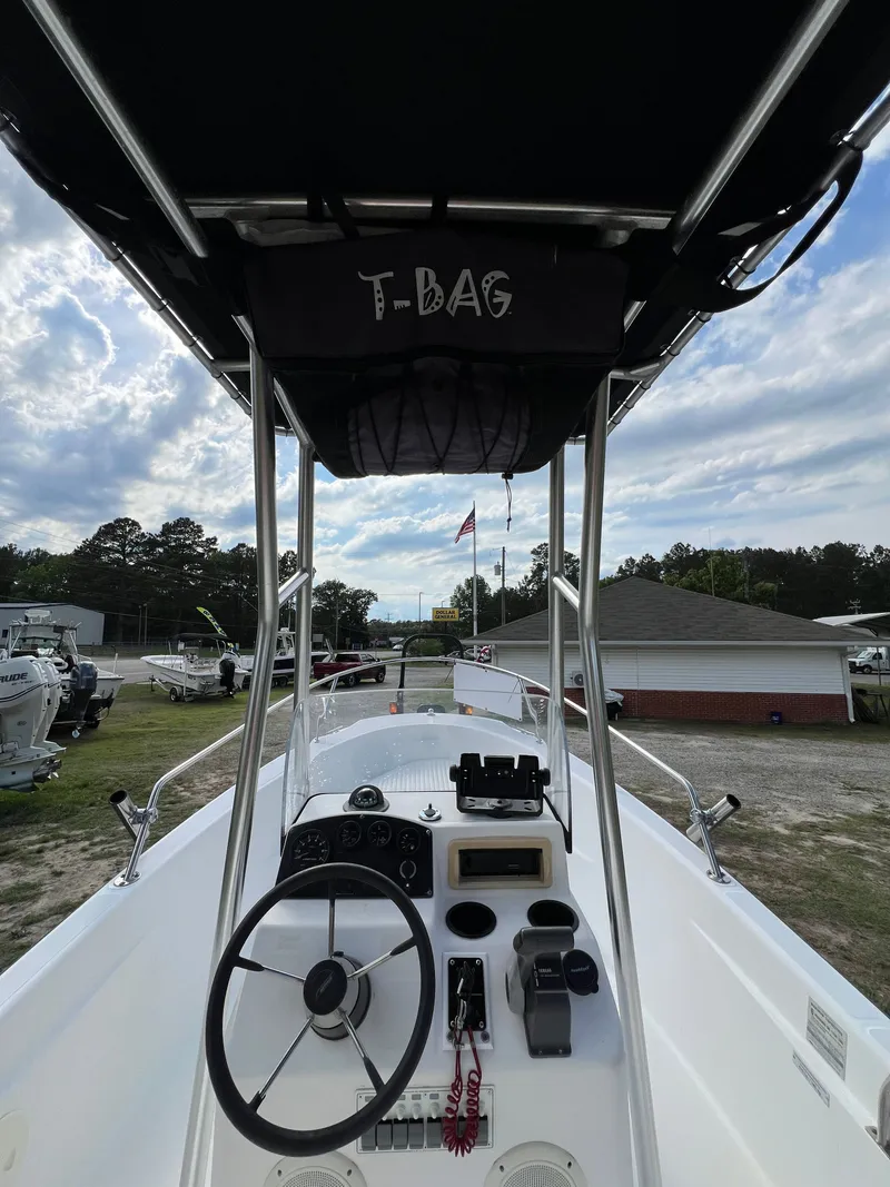 Slide: The Image of Interior view of a 2004 Boston Whaler 160 Dauntless boat. - 10