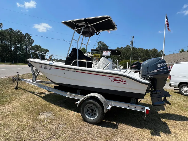 Slide: The Image of 2004 Boston Whaler 160 Dauntless boat on trailer, Yamaha engine. - 3