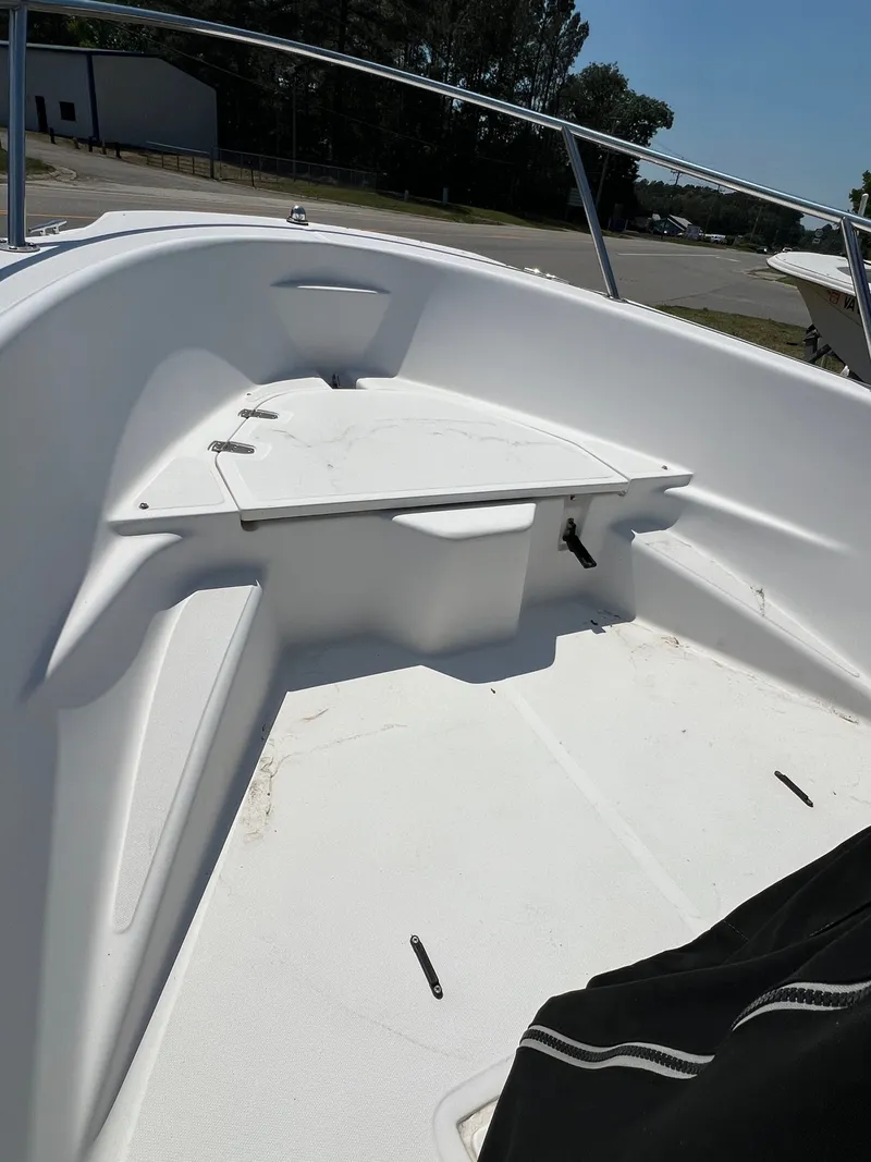 Slide: The Image of Interior view of a 2004 Boston Whaler 160 Dauntless boat. - 6