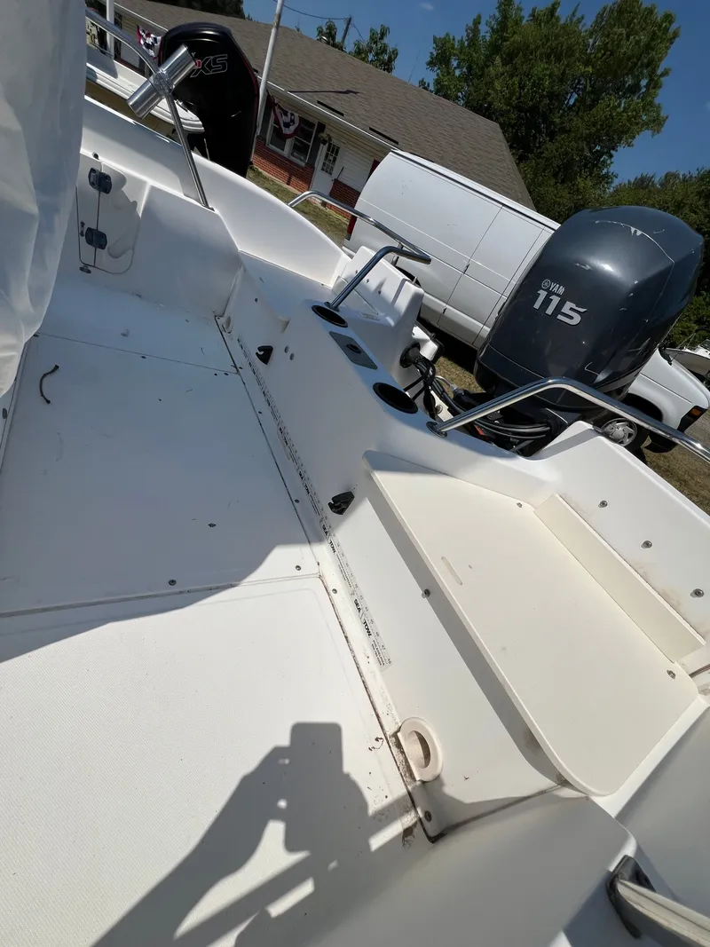 Slide: The Image of Interior view of a 2004 Boston Whaler 160 Dauntless boat. - 7