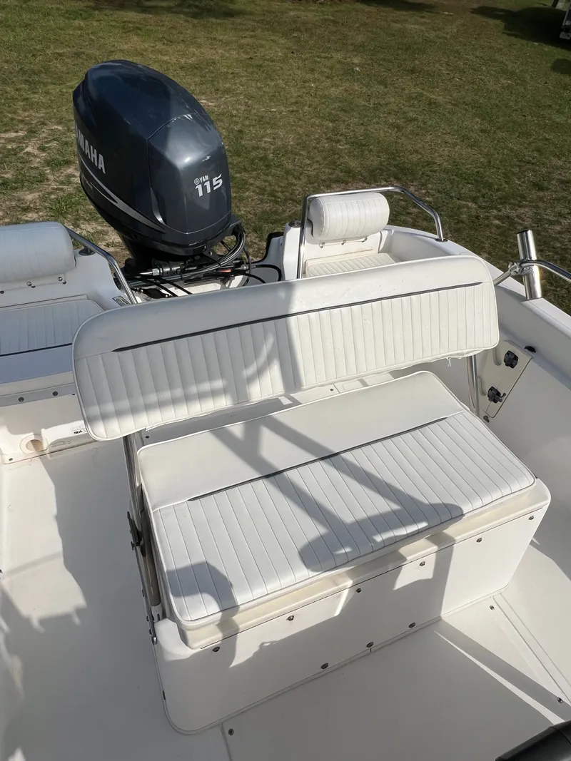 Slide: The Image of Boston Whaler 160 Dauntless 2004 with Yamaha 115 engine, white upholstery. - 8