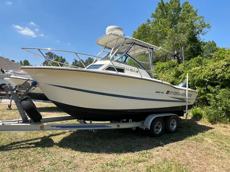 Slide: The Image of 1990 Hydra-Sports 2200 WA boat on trailer outdoors. - 1