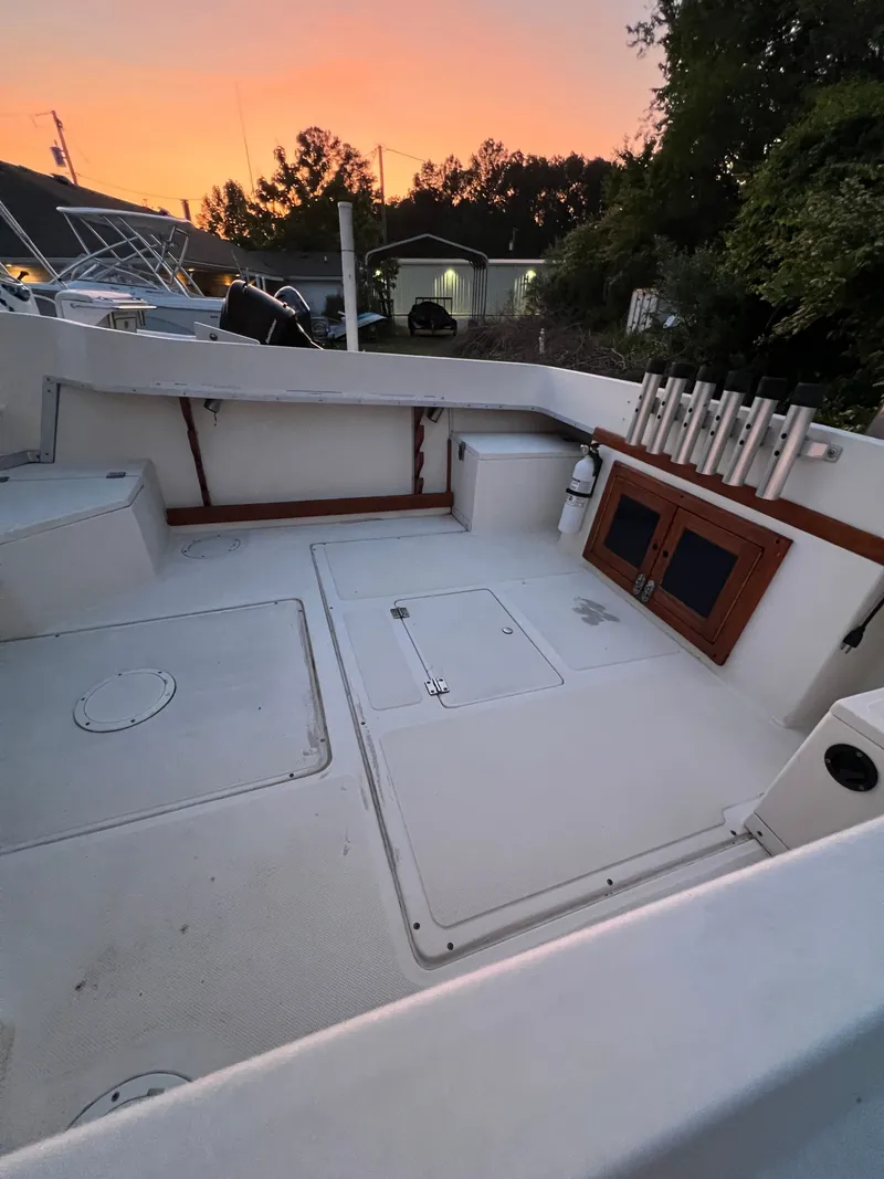 Slide: The Image of Interior of a 1990 Hydra-Sports 2200 WA boat at sunset. - 5