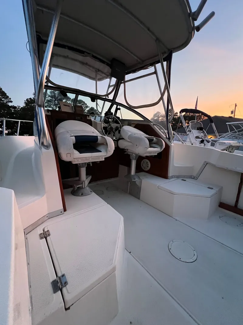 Slide: The Image of Interior view of a 1990 Hydra-Sports 2200 WA boat at sunset. - 6