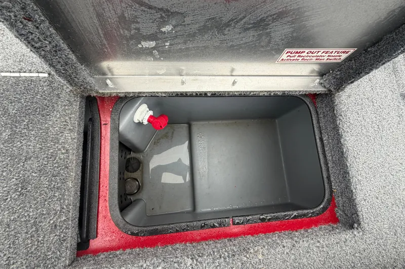 Slide: The Image of Open storage compartment in 2021 Tracker Pro Team 195 TXW boat. - 14