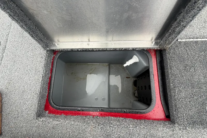 Slide: The Image of Open storage compartment in 2021 Tracker Pro Team 195 TXW boat. - 15