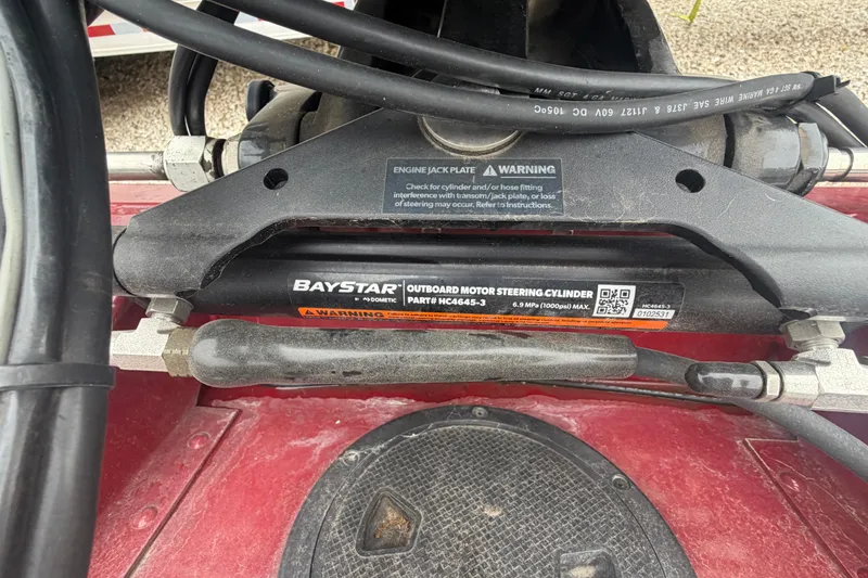Slide: The Image of BayStar outboard motor steering cylinder on 2021 Tracker Pro Team 195 TXW boat. - 18
