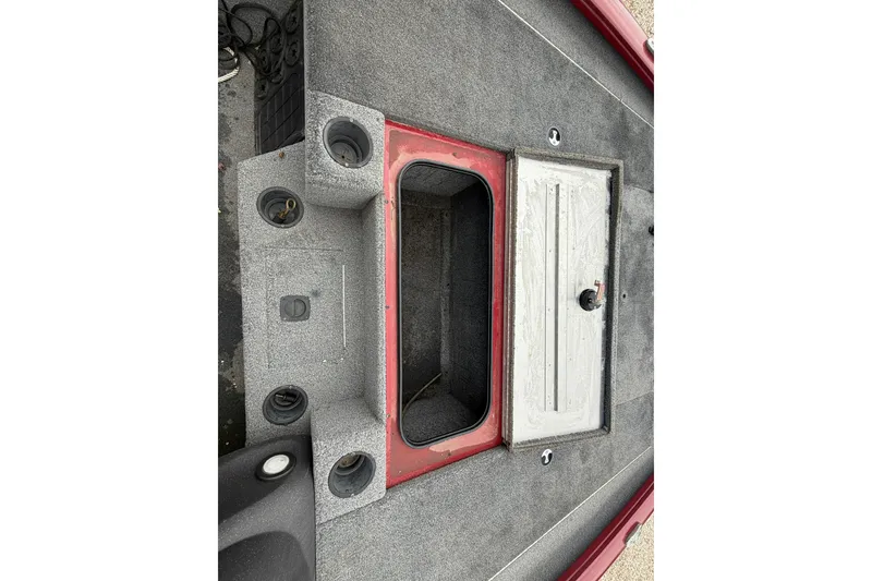 Slide: The Image of 2021 Tracker Pro Team 195 TXW boat interior with storage compartments. - 21
