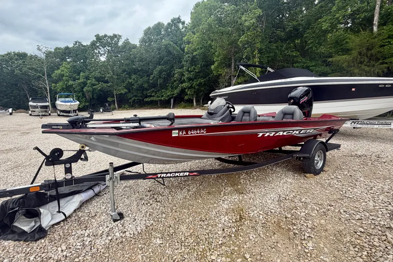 The Image of 2021 Tracker Pro Team 195 TXW boat on trailer, parked outdoors. - 4