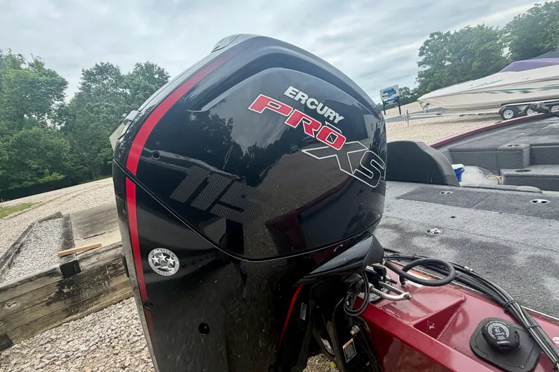 Slide: The Image of 2021 Tracker Pro Team 195 TXW with Mercury Pro XS engine, parked outdoors. - 6