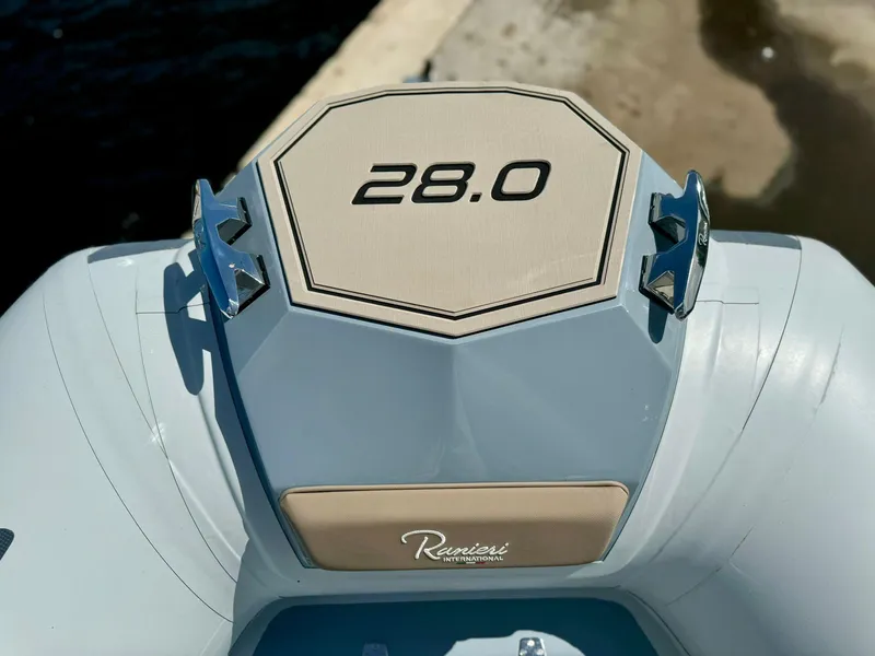Slide: The Image of 2025 Ranieri CAYMAN 28 EXECUTIVE boat stern with model number 28.0 displayed. - 20