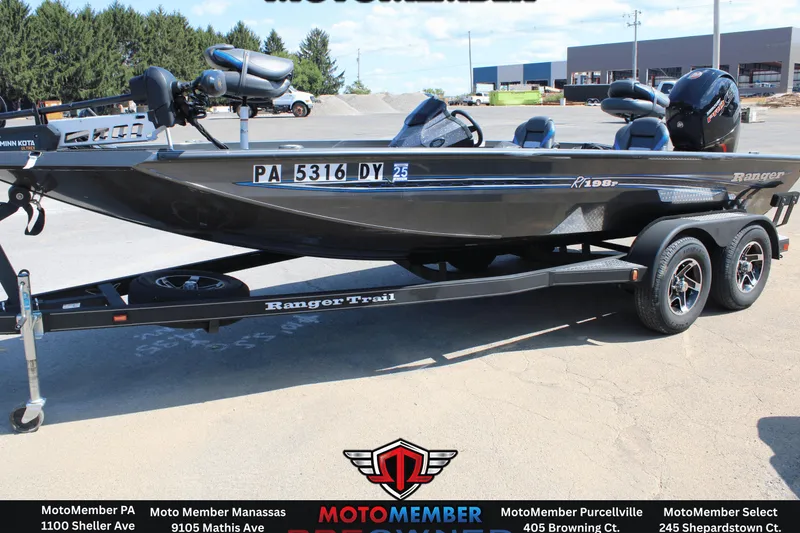 The Image of 2020 Ranger RT198P boat on trailer, displayed outdoors at dealership. - 0
