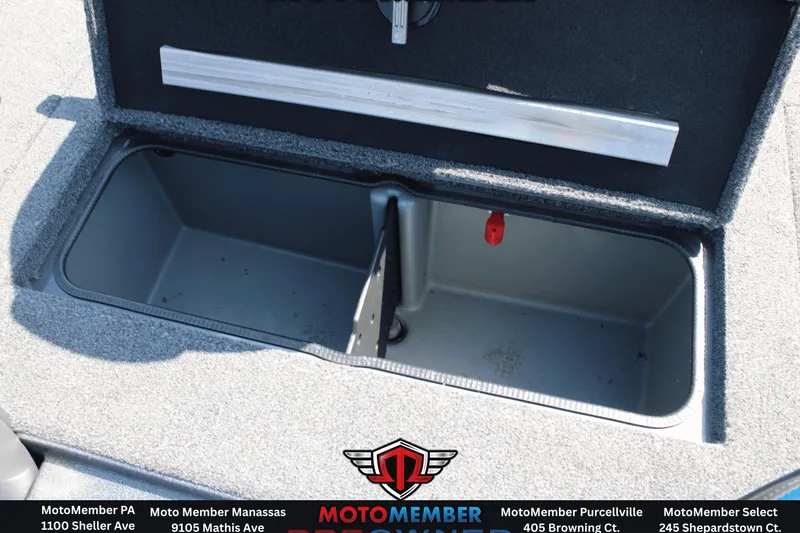 Slide: The Image of Open storage compartment in 2020 Ranger RT198P boat. - 10