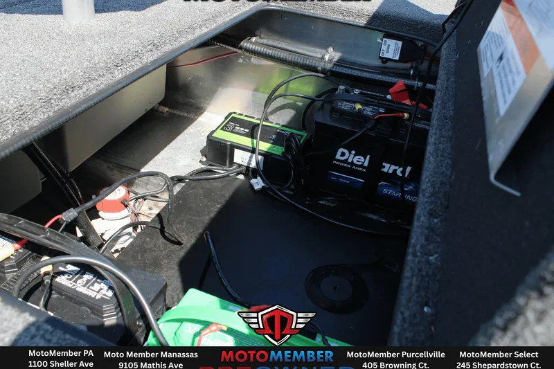 Slide: The Image of Interior view of a 2020 Ranger RT198P boat showing battery and wiring components. - 13