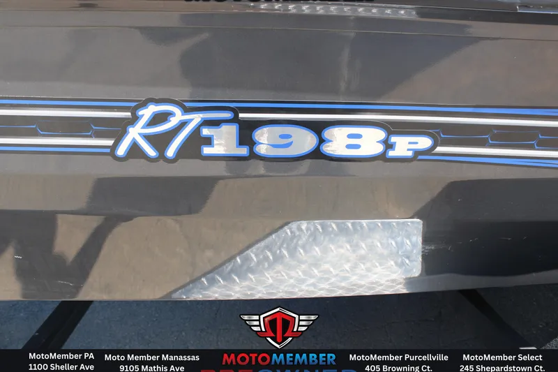 Slide: The Image of 2020 Ranger RT198P boat model logo with blue and white accents. - 15
