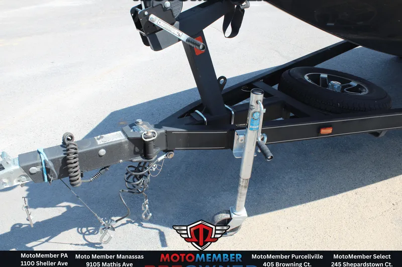 Slide: The Image of Trailer hitch of a 2020 Ranger RT198P boat on pavement. - 18