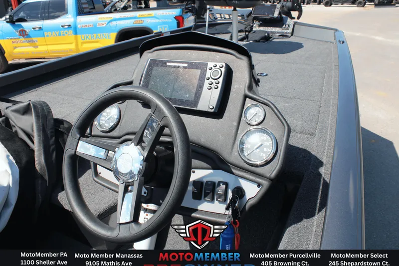 Slide: The Image of 2020 Ranger RT198P boat dashboard with steering wheel and electronic display. - 6