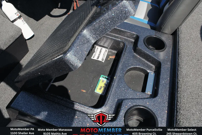 Slide: The Image of 2020 Ranger RT198P boat interior storage compartment with cup holders and accessories. - 7