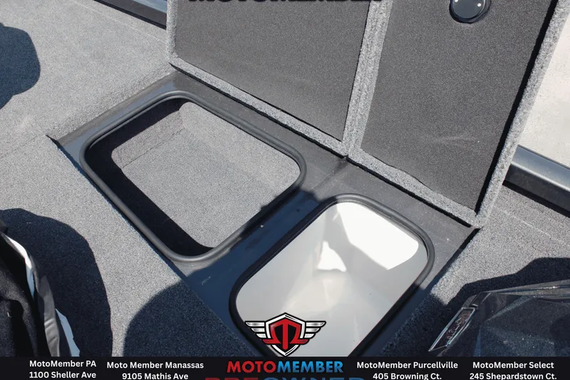 Slide: The Image of 2020 Ranger RT198P boat storage compartments with open lids, showcasing interior space. - 8