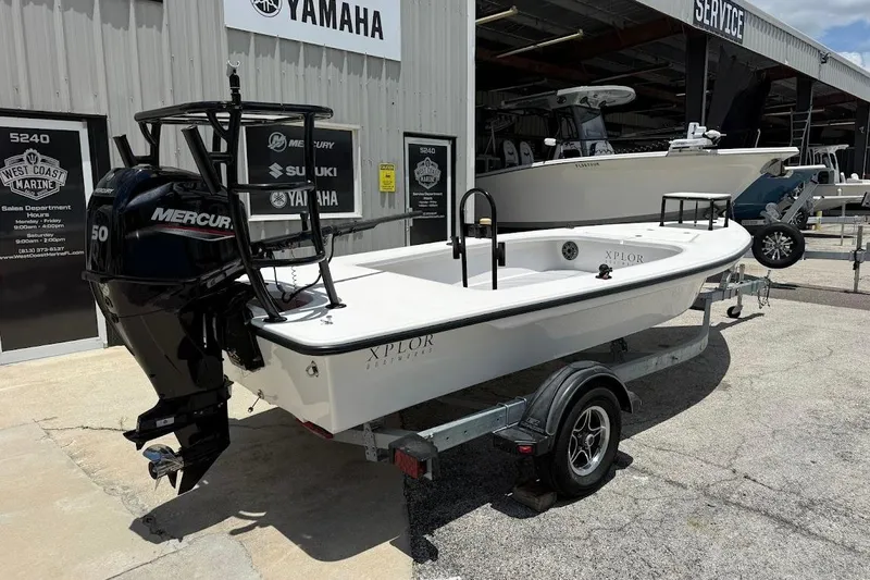 Slide: The Image of 2024 Delta Boatworks Delta D18 with Mercury engine on trailer at dealership. - 11