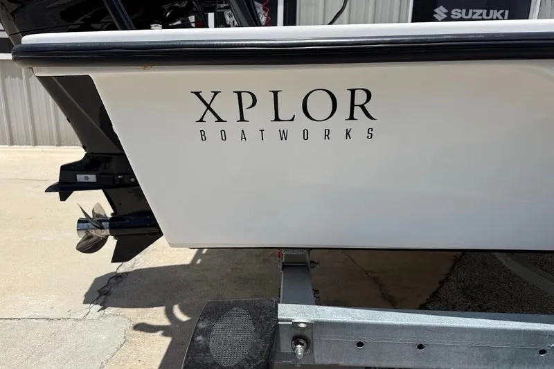 Slide: The Image of 2024 Delta D18 boat by Delta Boatworks, featuring Xplor Boatworks branding. - 12