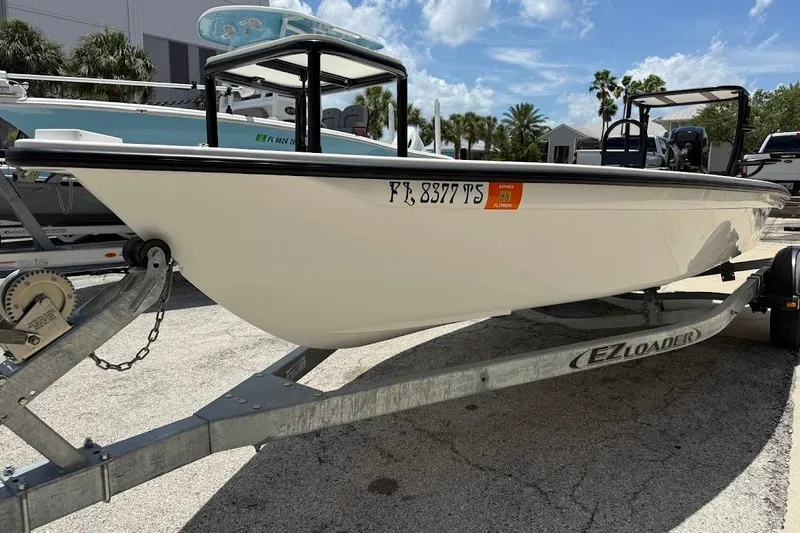 Slide: The Image of 2024 Delta Boatworks Delta D18 on EZ Loader trailer, parked outdoors. - 14