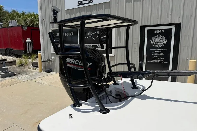 Slide: The Image of 2024 Delta D18 boat with Mercury engine at West Coast Marine dealership. - 8