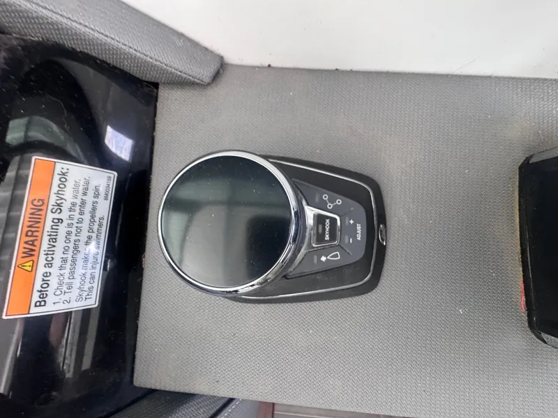 Slide: The Image of Control unit of 2023 Cruisers Yachts 38 GLS with Skyhook warning. - 14