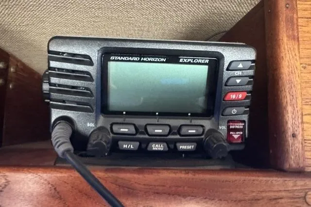 Slide: The Image of Standard Horizon Explorer radio on 1983 Nordic Tug 26 boat dashboard. - 19