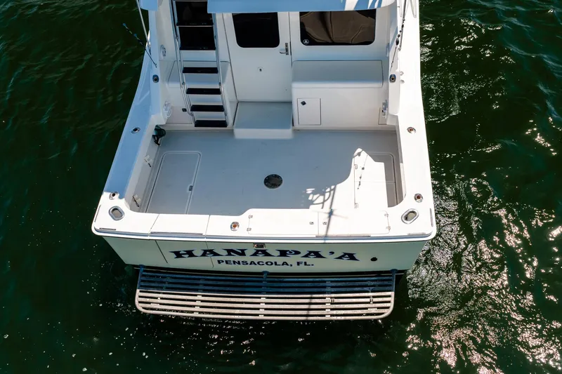 Slide: The Image of 1994 Luhrs 38 Convertible boat docked in Pensacola, Florida, viewed from above. - 56