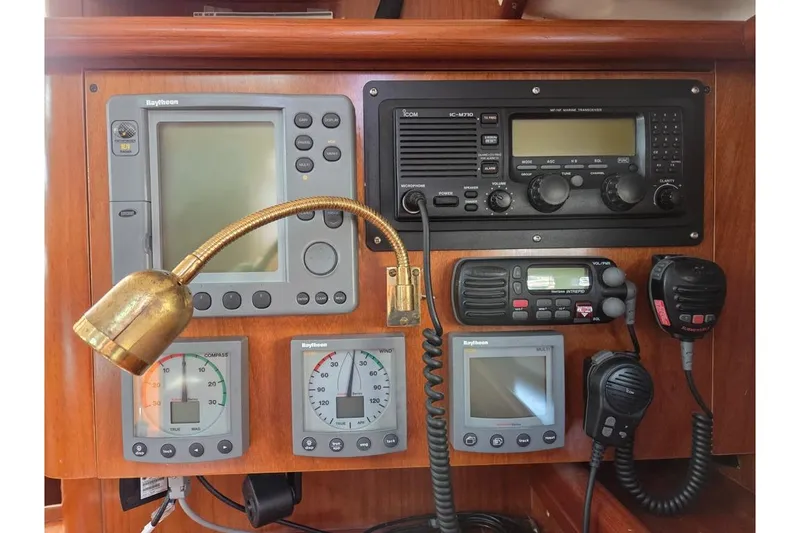Slide: The Image of Nav station Raytheon electronics, VHF, and SSB - 10