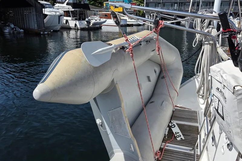 Slide: The Image of Inflatable dinghy secured on a 2000 Beneteau Oceanis 411 - 16