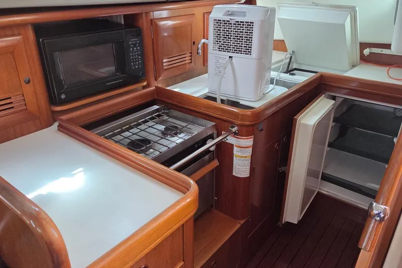 Slide: The Image of Full-featured galley with stove/oven, sink, fridge, freezer, and microwave - 7