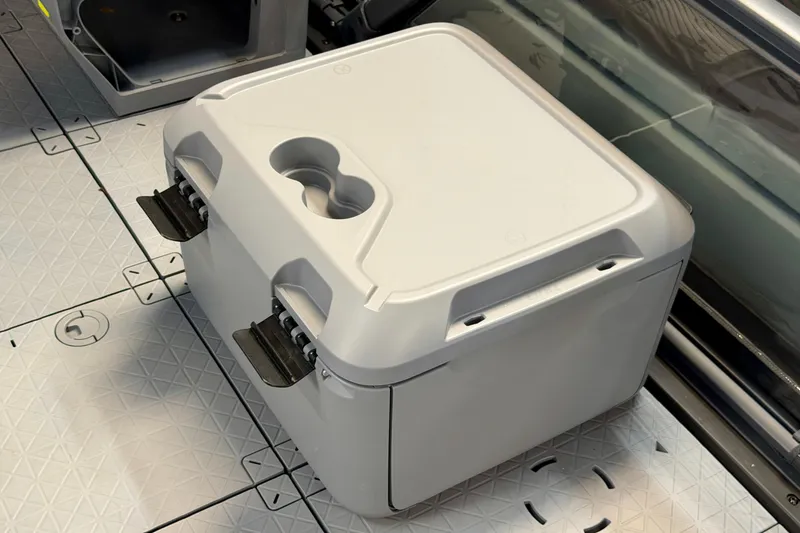 Slide: The Image of White storage box on Sea-Doo Switch Fish 21 deck, 2026 model. - 13