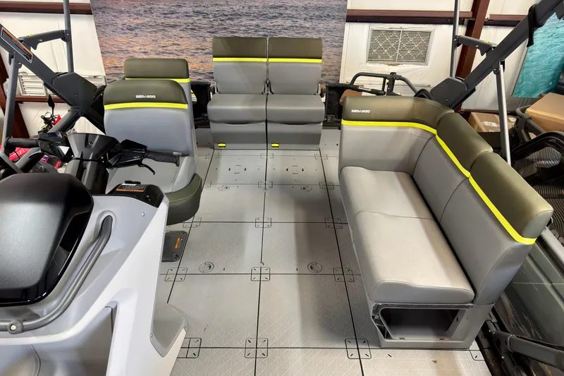 Slide: The Image of Interior view of 2026 Sea-Doo Switch Fish 21, featuring spacious seating and modern design. - 14