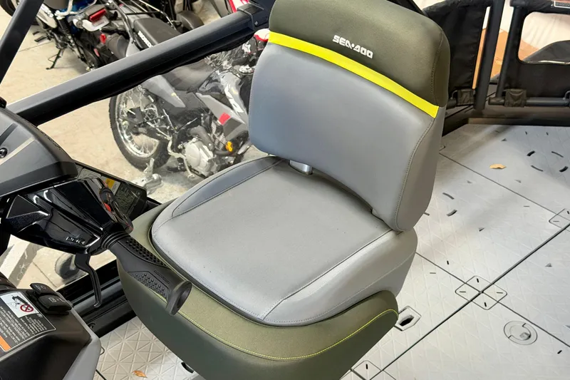 Slide: The Image of 2026 Sea-Doo Switch Fish 21 seat with steering controls, showcasing modern design. - 21