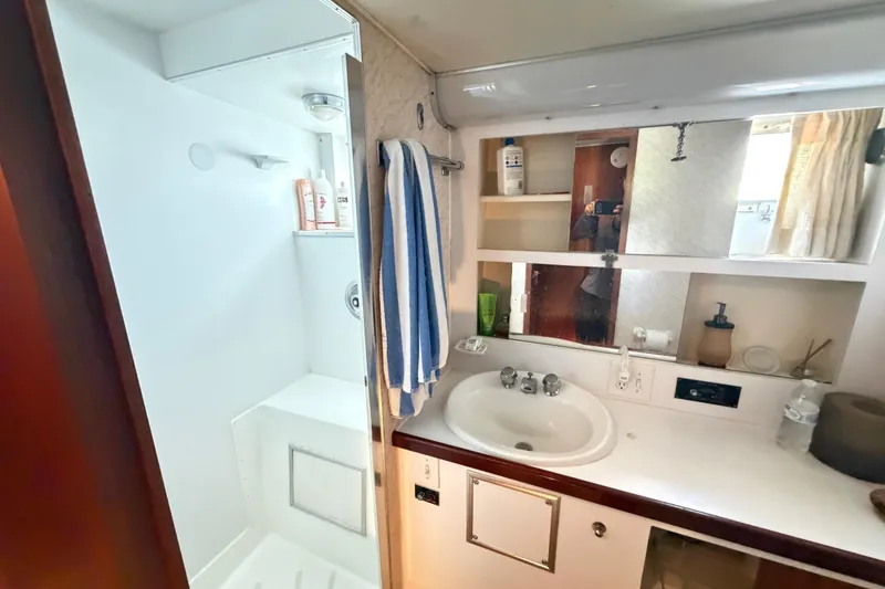 Slide: The Image of Bathroom interior of a 1978 Hatteras 53 Motor Yacht with shower and sink. - 21