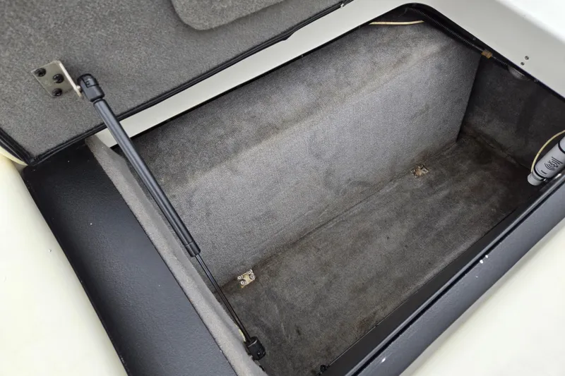 Slide: The Image of Open storage compartment in 2004 Malibu Wakesetter 23 LSV boat. - 44