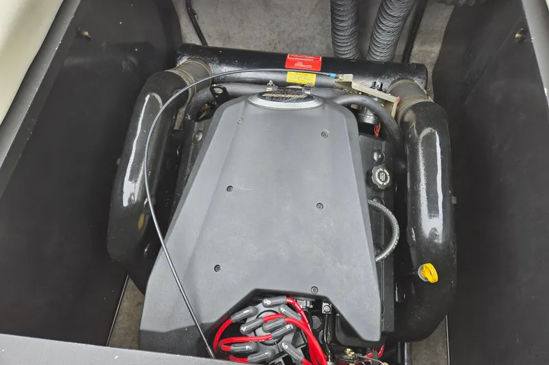 Slide: The Image of Engine compartment of a 2004 Malibu Wakesetter 23 LSV boat. - 45