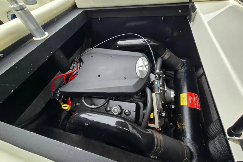 Slide: The Image of Engine compartment of a 2004 Malibu Wakesetter 23 LSV boat. - 46