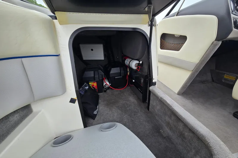 Slide: The Image of Interior storage compartment of a 2004 Malibu Wakesetter 23 LSV boat. - 51