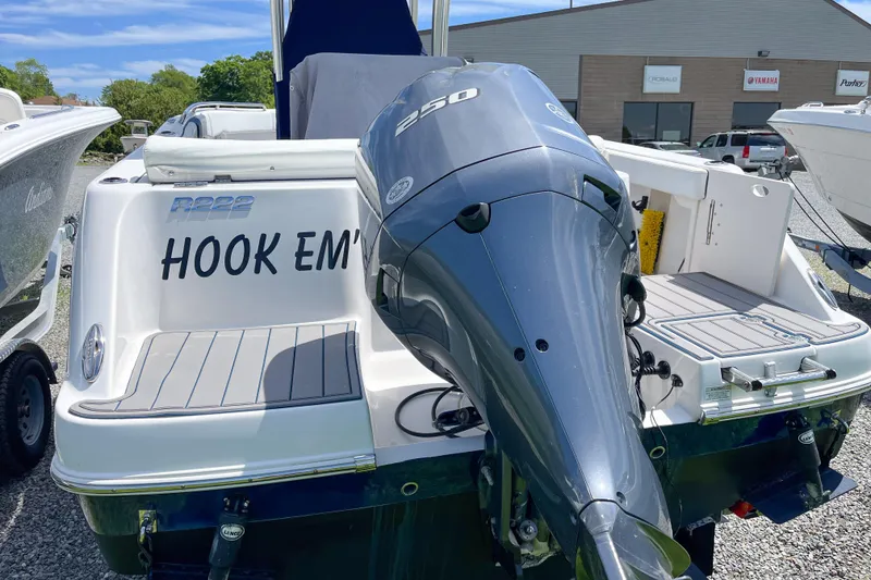 Slide: The Image of 2017 Robalo R222 Center Console boat with powerful outboard motor. - 11