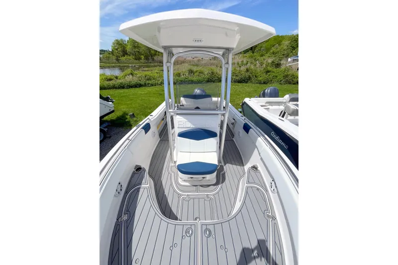 Slide: The Image of 2017 Robalo R222 Center Console boat interior with seating and console view. - 9