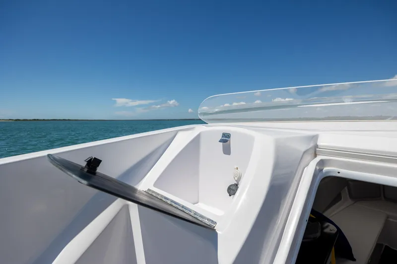 Slide: The Image of 2014 Baja 35 Outlaw boat interior with open hatch, ocean view. - 14