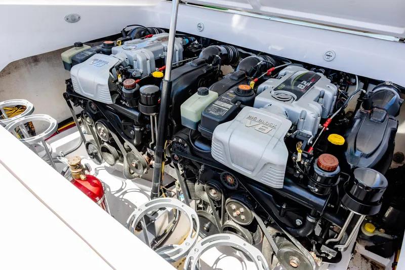 Slide: The Image of 2014 Baja 35 Outlaw boat engine compartment with dual powerful engines. - 29