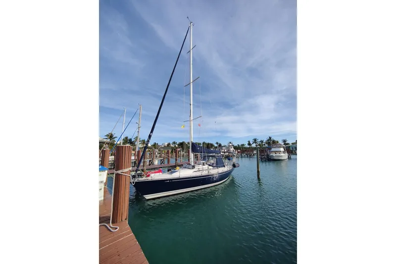 The Image of Sailboat docked at marina, C&C 37/40 XL, 1993 model, under clear blue sky. - 0